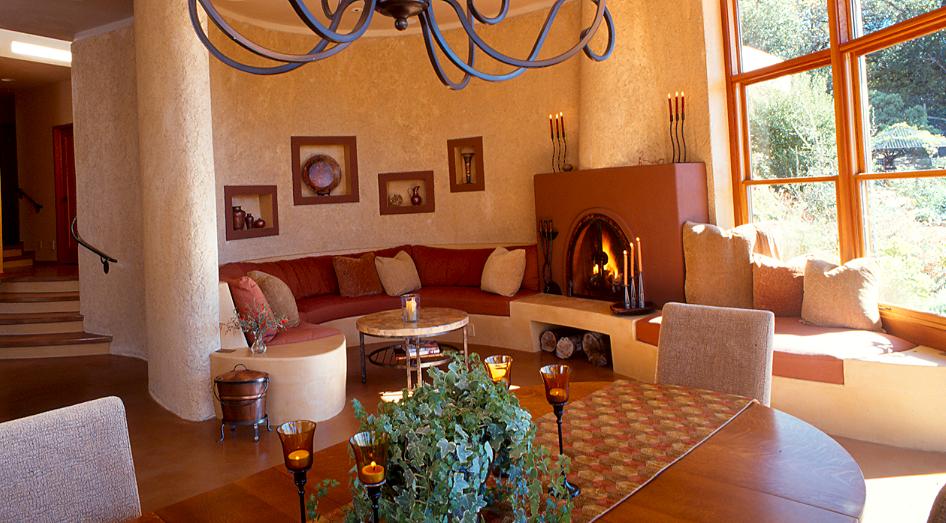 The open great room lets guests mingle—whether they’re sitting at the table or relaxing by the fire.